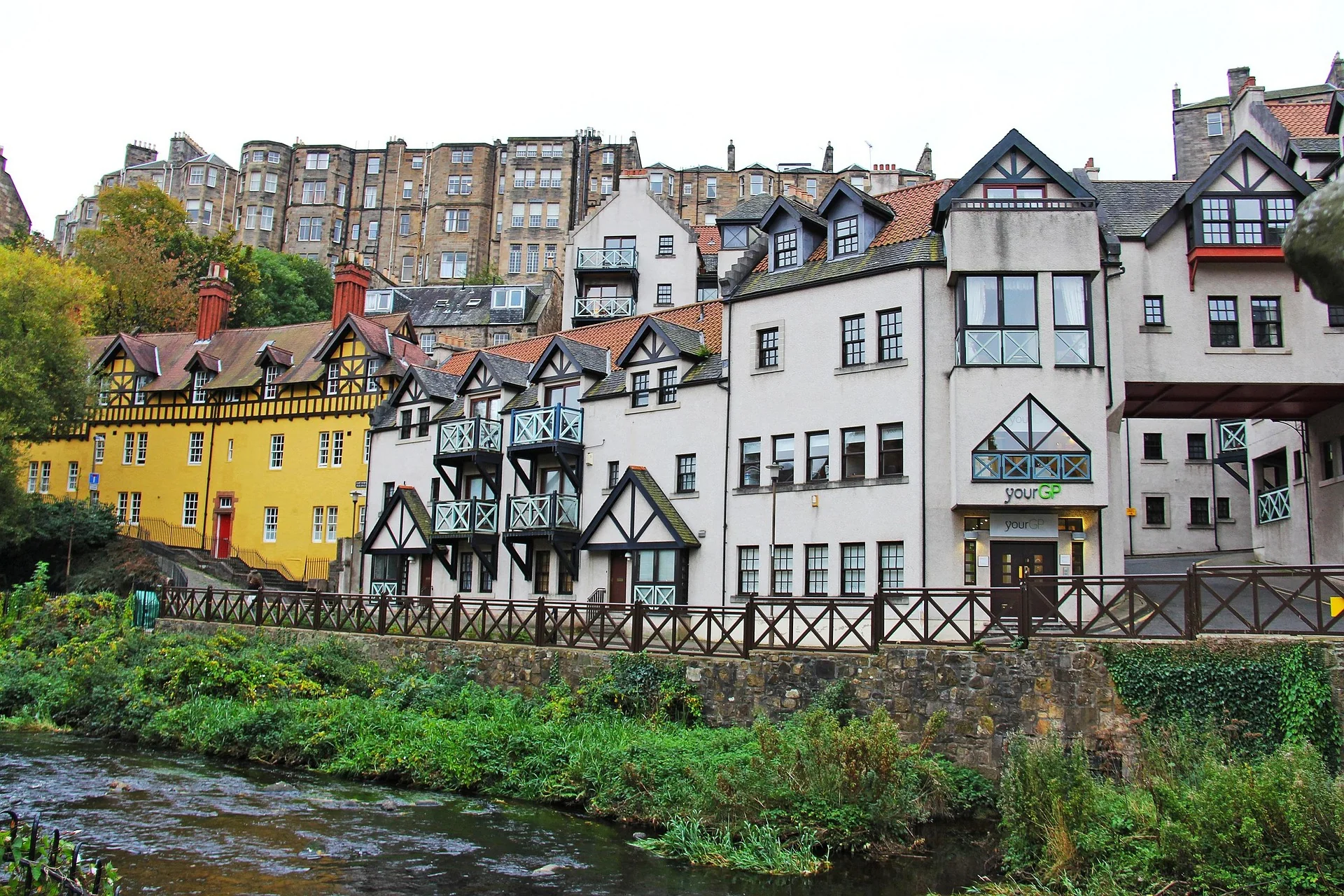 Scenic Dean Village historic river and sandstone townhouses in Edinburgh